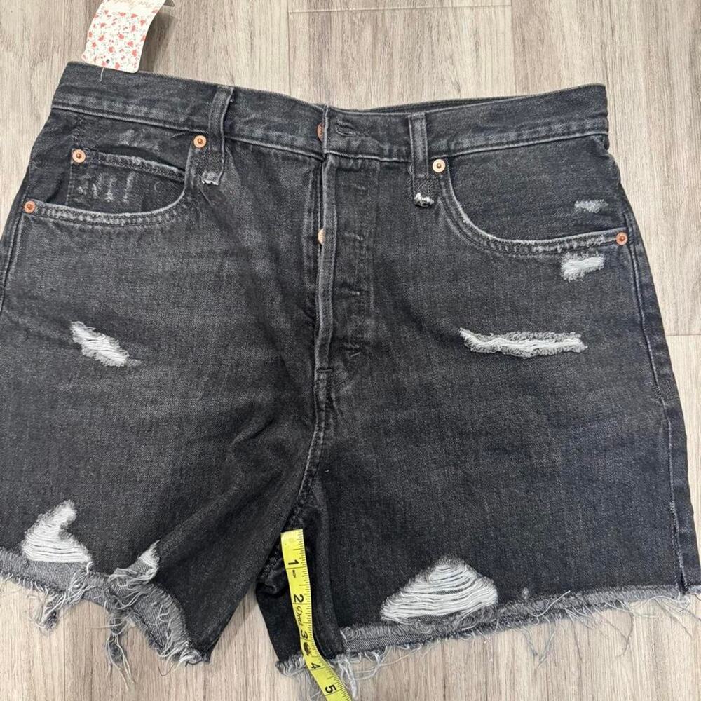 Free people black denim cut off shorts
